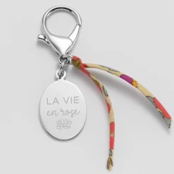 Bijou de sac personnalisé médaille gravée acier ovale 33x25 mm et noeud Liberty