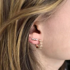 Boucles d'oreilles créoles étoile brillante plaqué or