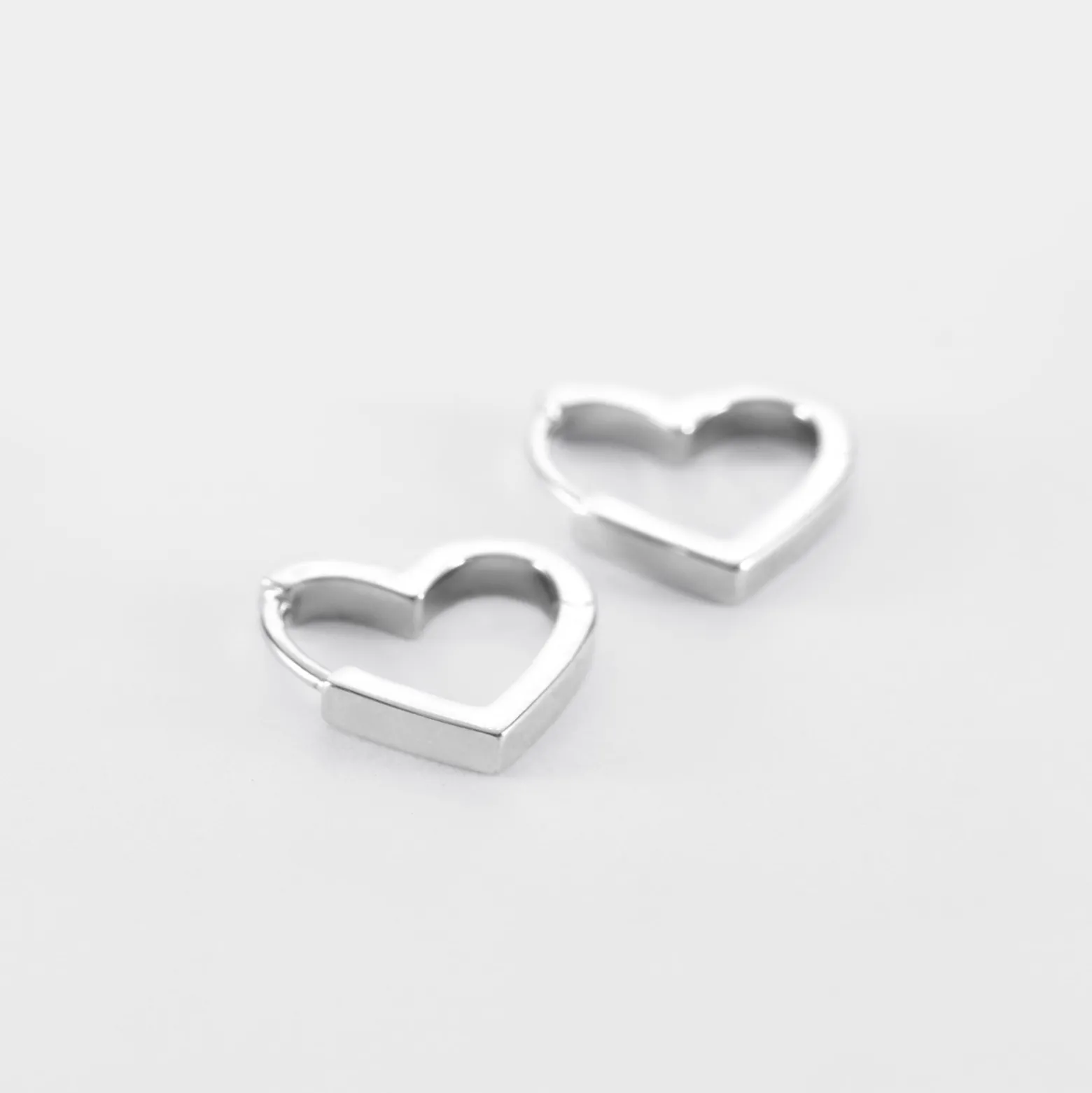 Boucles d'oreilles créoles coeur argent