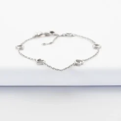 Bracelet chaîne coeurs ajourés argent