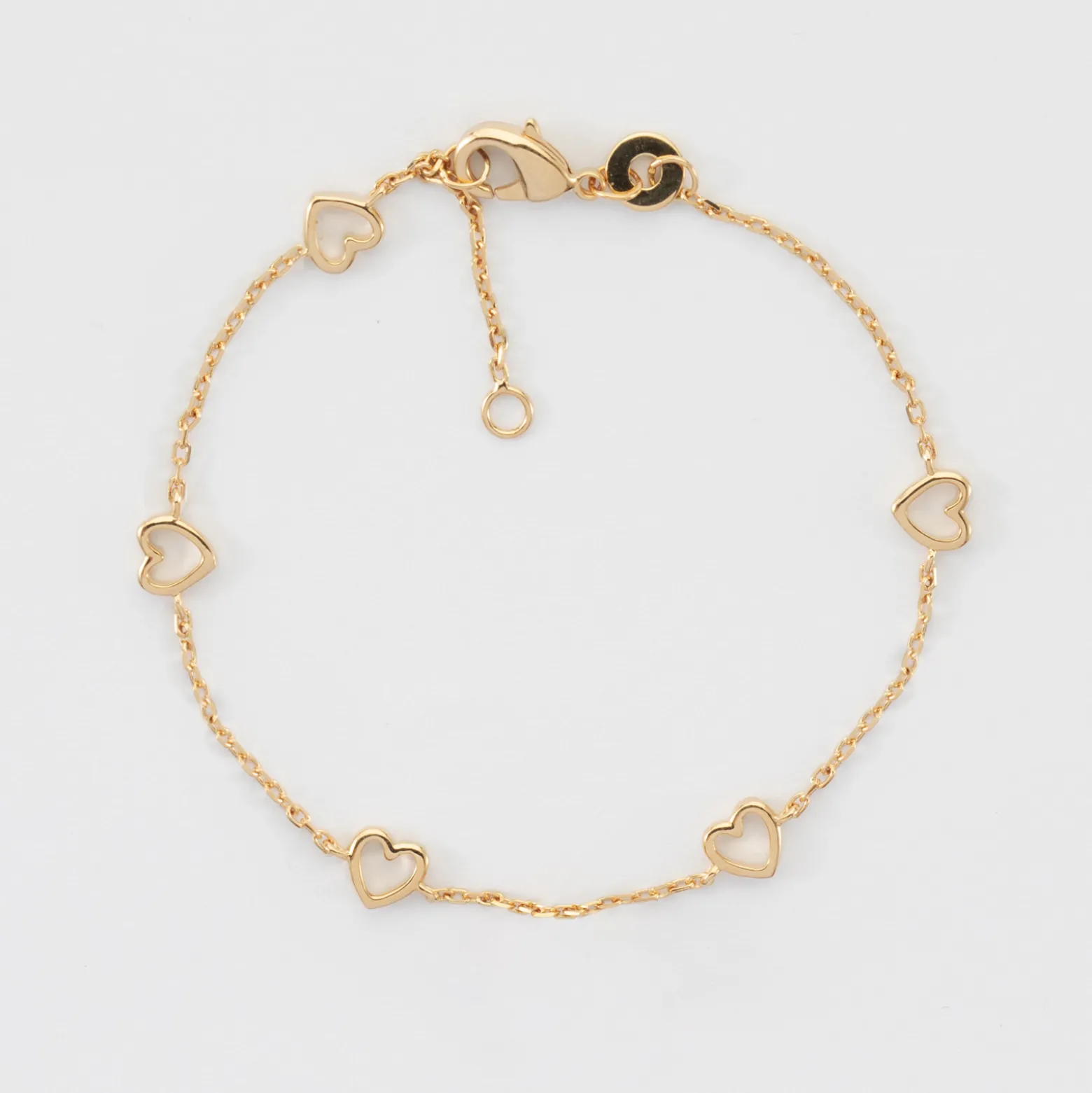 Bracelet chaîne coeurs ajourés plaqué or