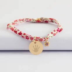 Bracelet enfant Liberty personnalisé médaille gravée plaqué or 15 mm et breloque fleur zircon plaqué or 8 mm