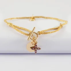 Bracelet fermoir personnalisé cordon pailleté médaille gravée plaqué or 10 mm et breloque fleur pétales zircons 10 mm