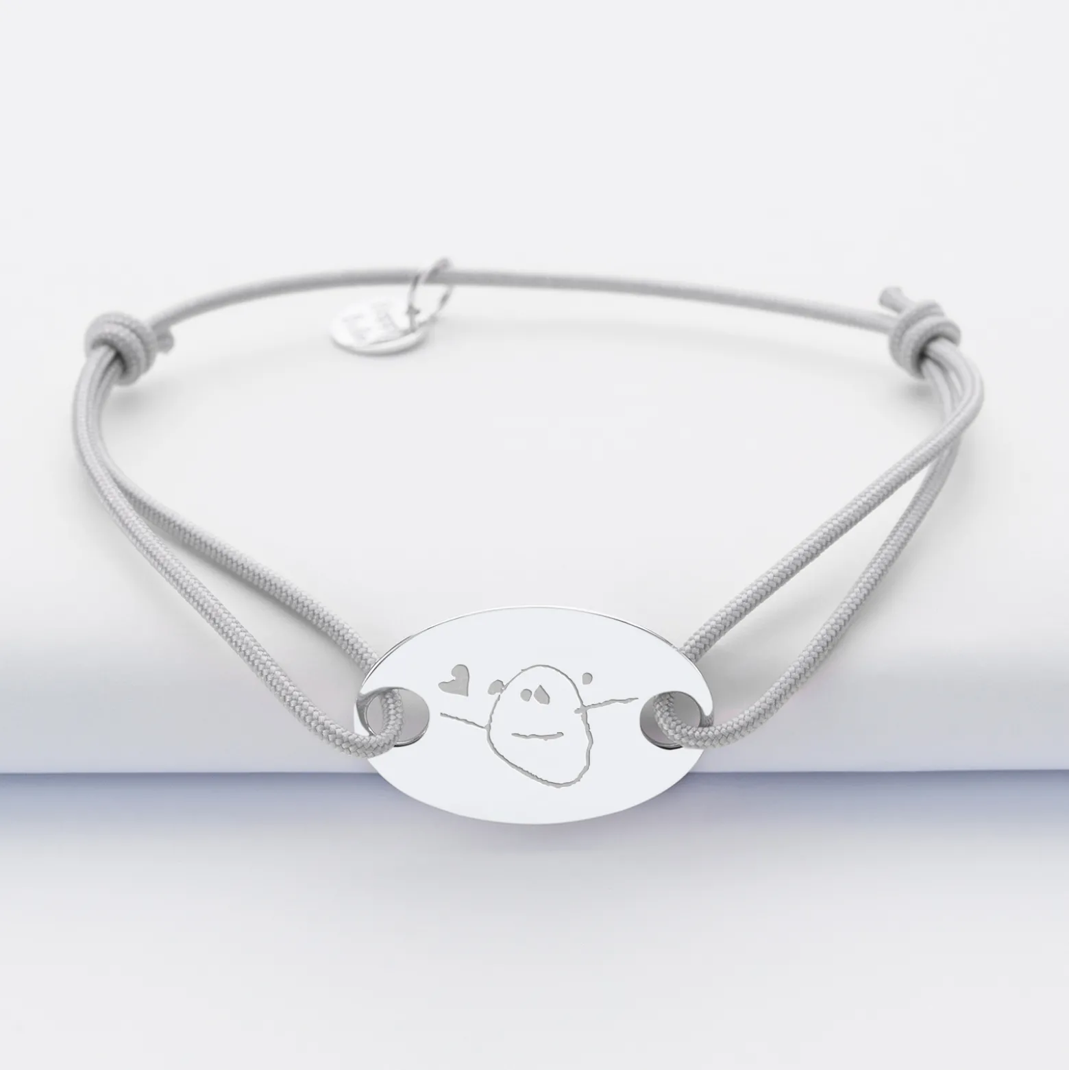Bracelet homme personnalisé cordon simple médaille gravée argent ovale 2 trous 25x16 mm