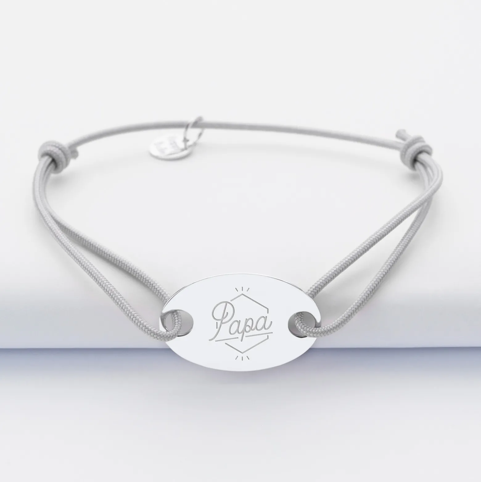 Bracelet homme personnalisé cordon simple médaille gravée argent ovale 2 trous 25x16 mm