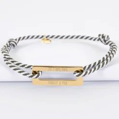 Bracelet homme personnalisé cordon tressé médaille gravée acier doré rectangle évidé 32x14 mm