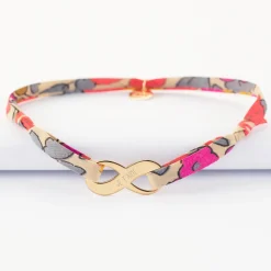 Bracelet infini Liberty médaille gravée plaqué or 25x10mm