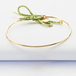 Bracelet jonc plaqué or et cordon pailleté