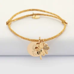 Bracelet personnalisé cordon pailleté médaille gravée plaqué or 15 mm et breloque trèfle scintillant 15 mm
