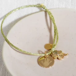 Bracelet personnalisé cordon pailleté médaille gravée plaqué or 15 mm et breloque trèfle scintillant 15 mm