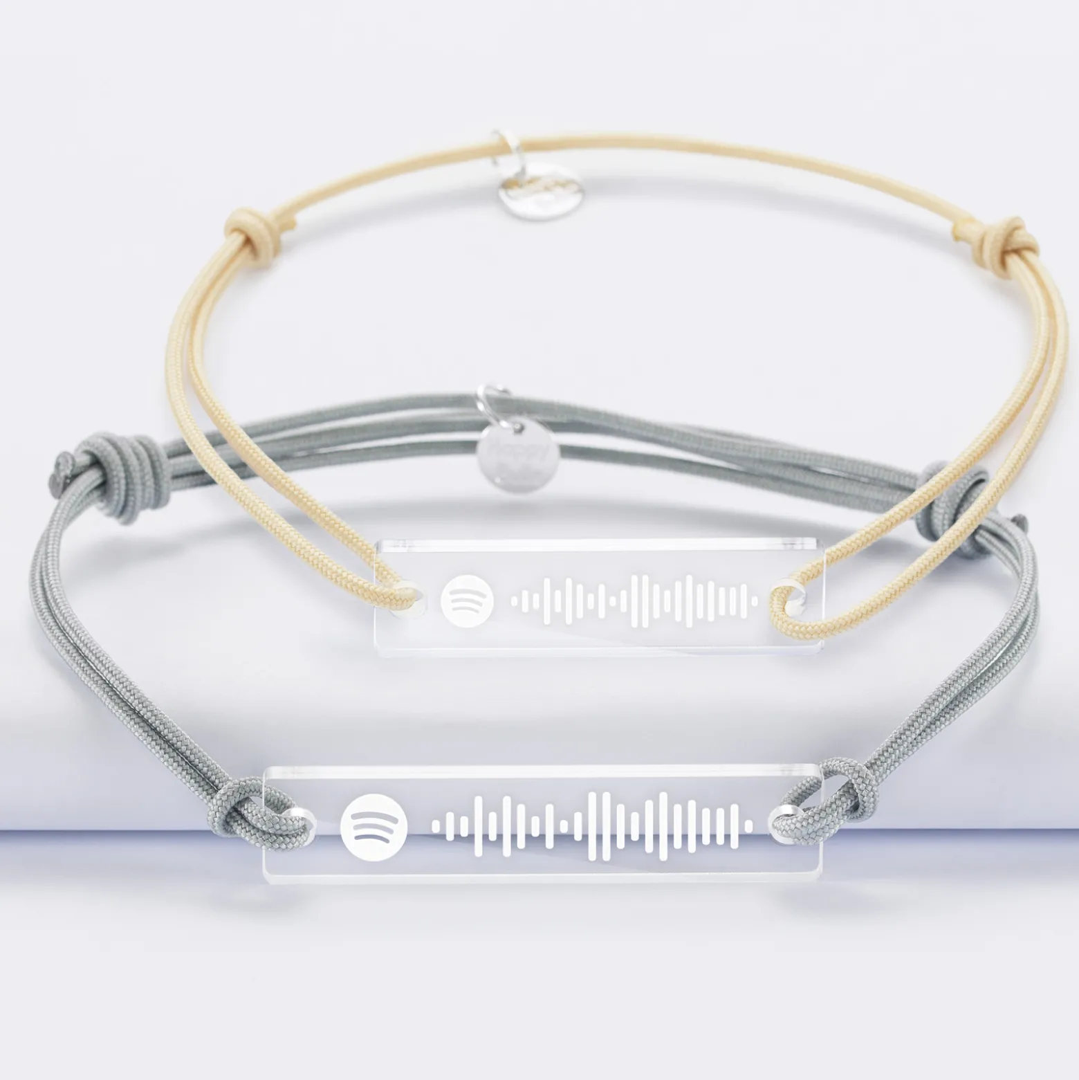 Duo de bracelets médailles gravées acrylique Spotify