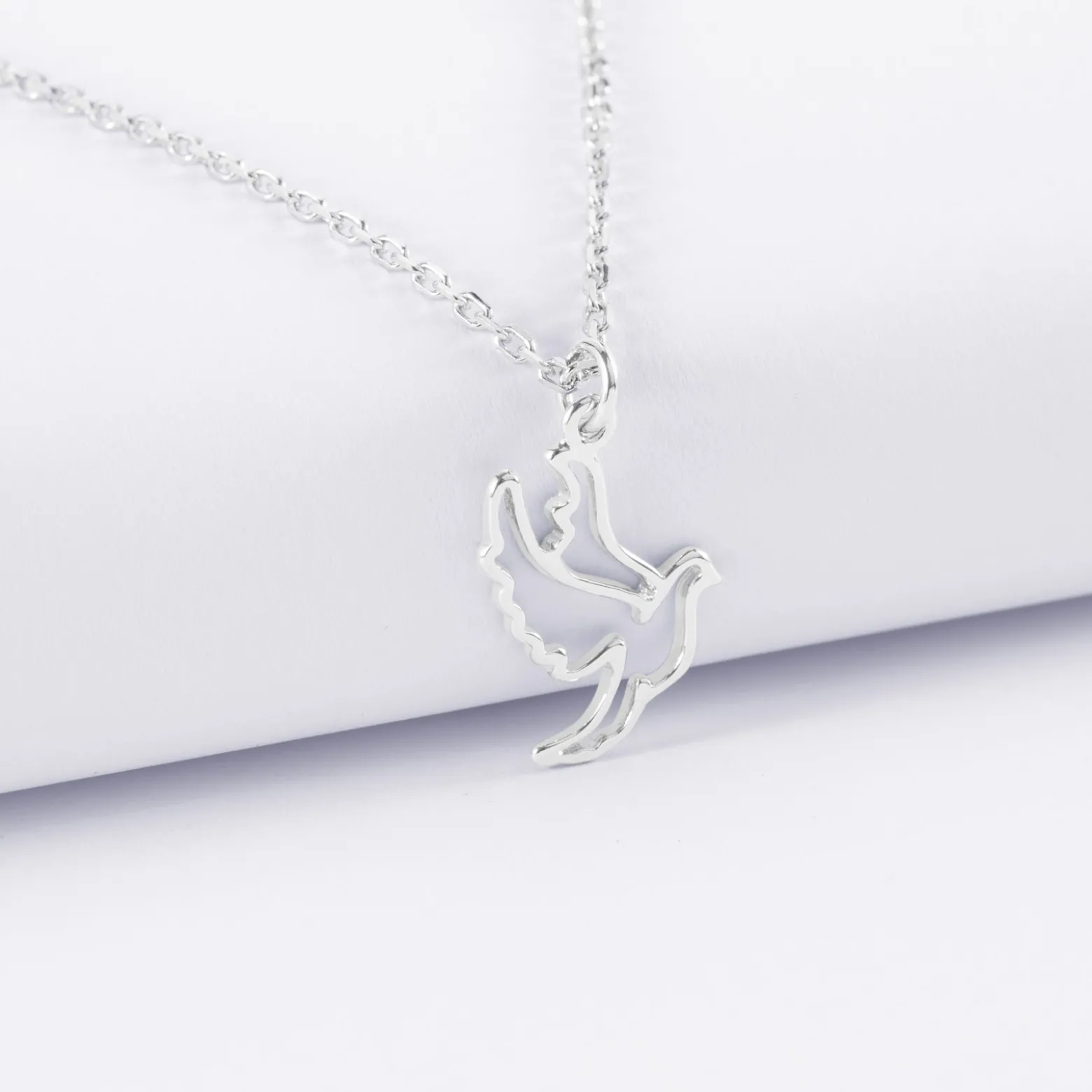 Pendentif enfant colombe argent 18 mm