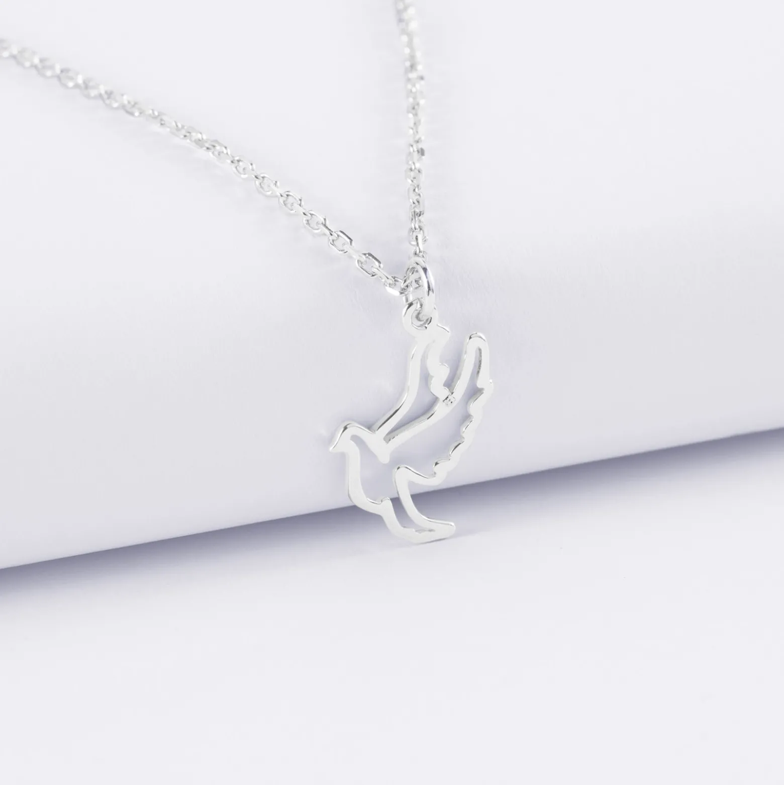 Pendentif enfant colombe argent 18 mm