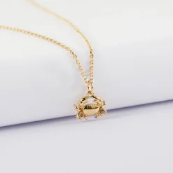 Pendentif enfant crabe plaqué or 7x12 mm