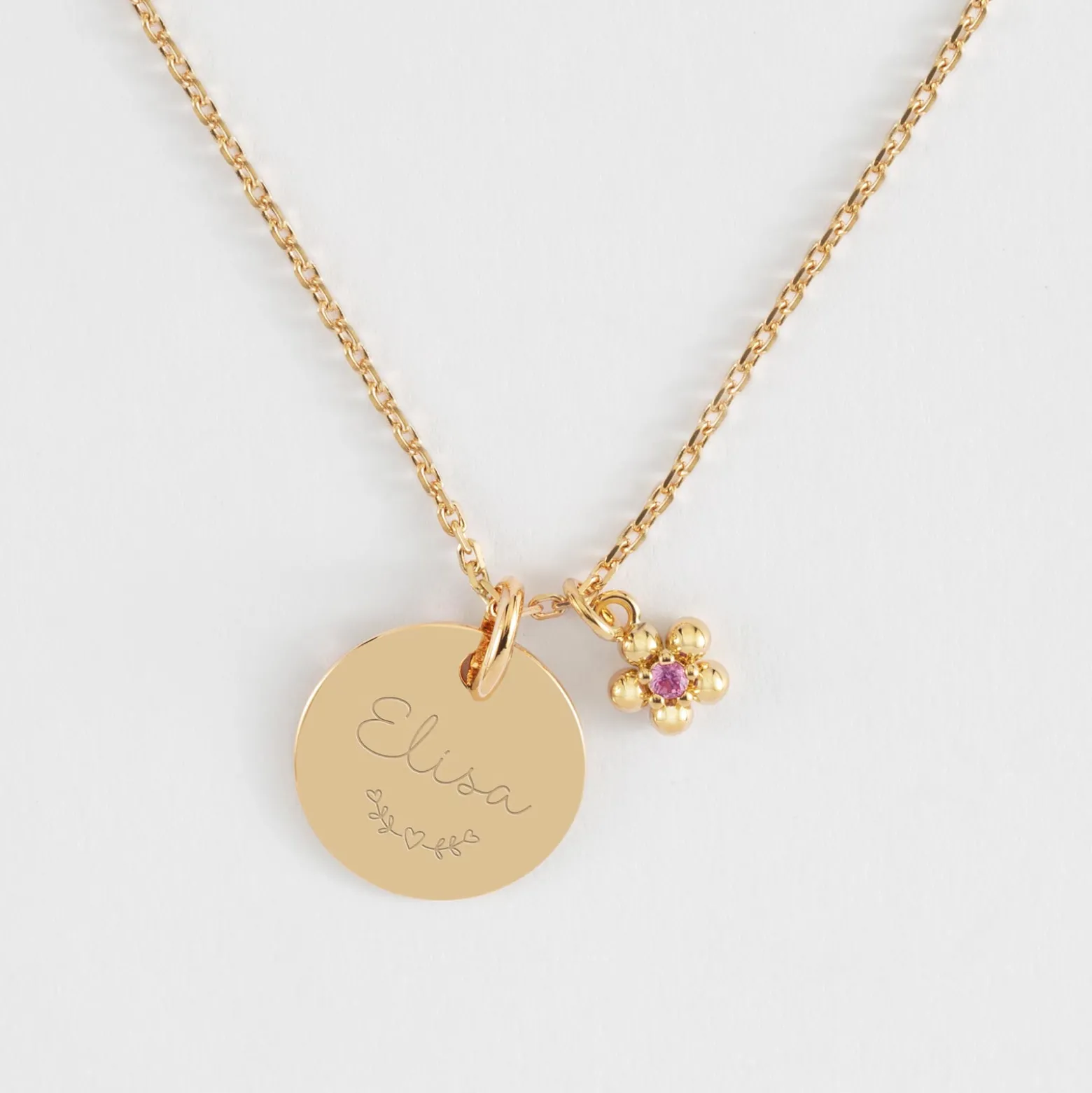 Pendentif enfant personnalisé médaille gravée plaqué or 15 mm et breloque fleur zircon plaqué or 8 mm