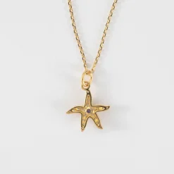 Pendentif enfant étoile de mer scintillante zircons bleus plaqué or 15 mm