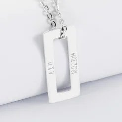 Pendentif homme personnalisé médaille gravée acier rectangle évidé 32x14 mm