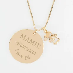 Pendentif personnalisé médaille gravée plaqué or 27 mm et breloque petite fille zircon 12 mm