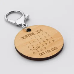 Porte-clés personnalisé calendrier médaille gravée bois