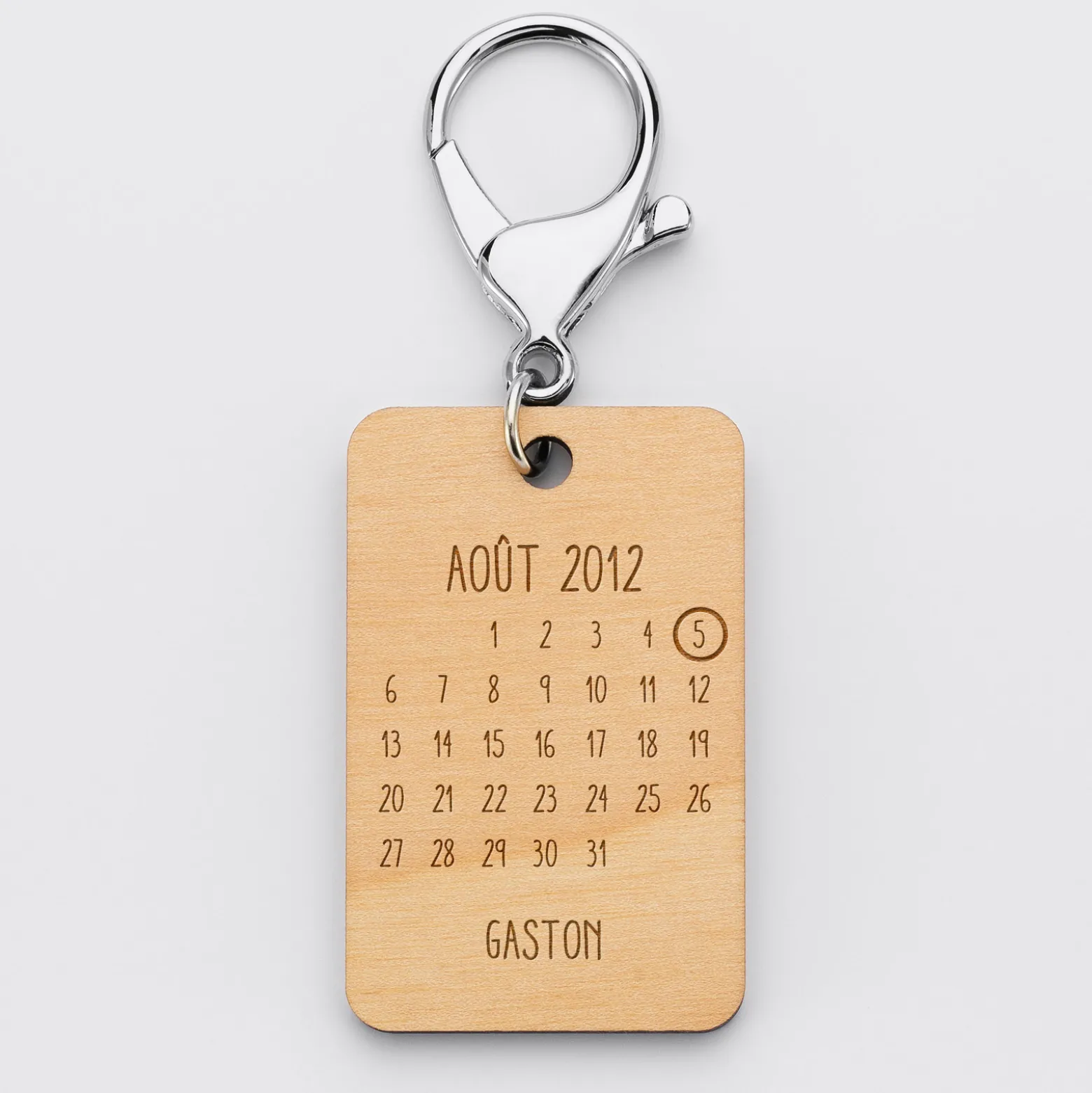 Porte-clés personnalisé calendrier médaille gravée bois
