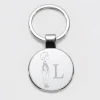 Porte-clés personnalisé initiale gravé acier rond 37 mm - HappyBulle x Marie Savart