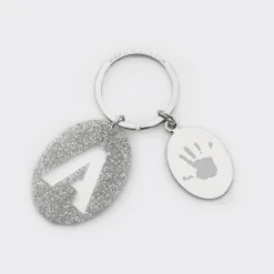 Porte-clés personnalisé médaille gravée ovale acier et breloque initiale acrylique pailleté argenté
