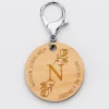 Porte-clés personnalisé médaille gravée bois ronde 50mm Initiale Florale