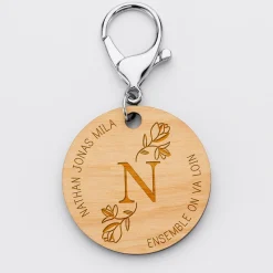 Porte-clés personnalisé médaille gravée bois ronde 50mm Initiale Florale
